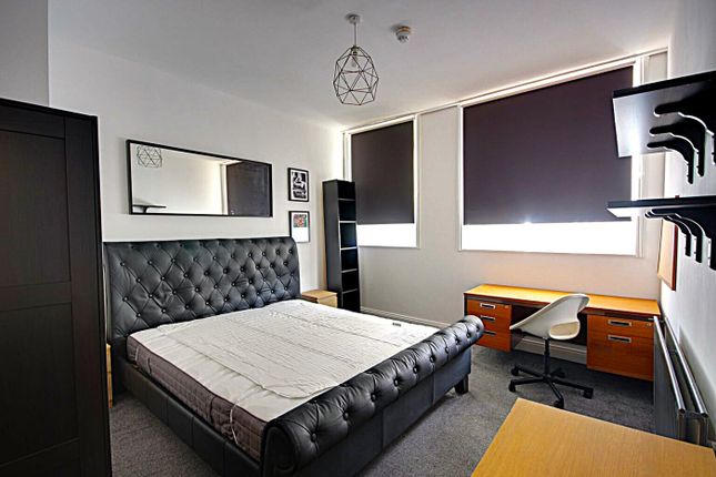 A Spacious And Well-Lit Double Bedroom Featuring m...