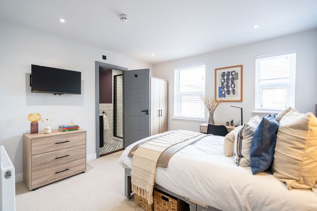Bright And Spacious Master Bedroom Featuring A Coz...