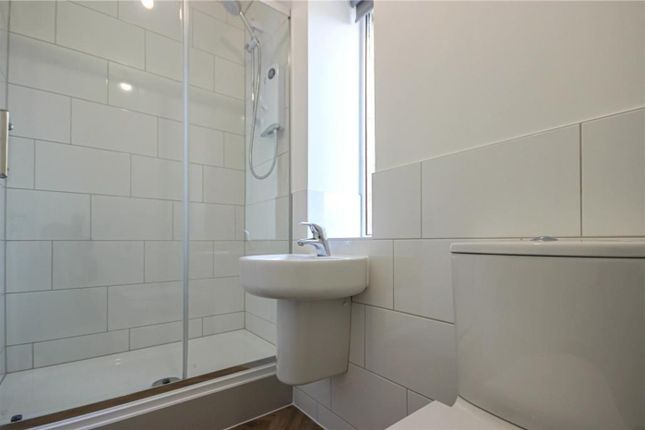 A Modern And Clean Bathroom Featuring A Spacious S...
