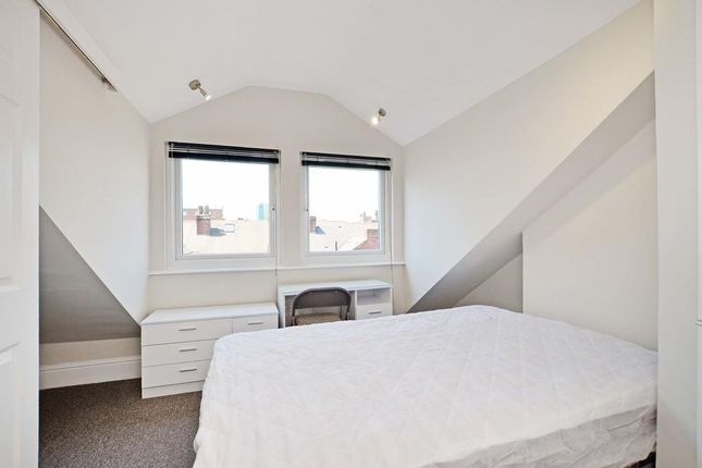 Bright And Cozy Master Bedroom Featuring A Comfort...