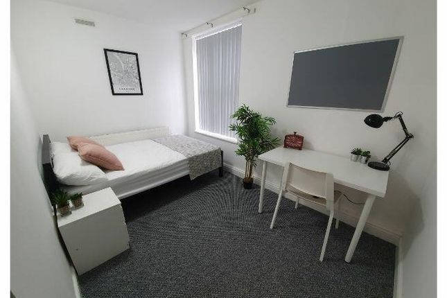 A Bright And Modern Living Room Featuring A Comfor...