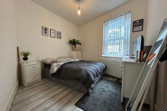 A Bright And Tidy Double Bedroom Featuring Stylish...