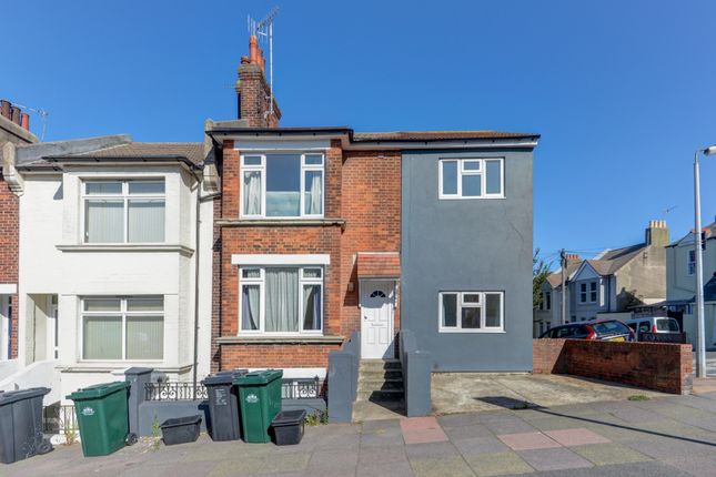 A Well-Maintained Terraced House Front With A Brig...
