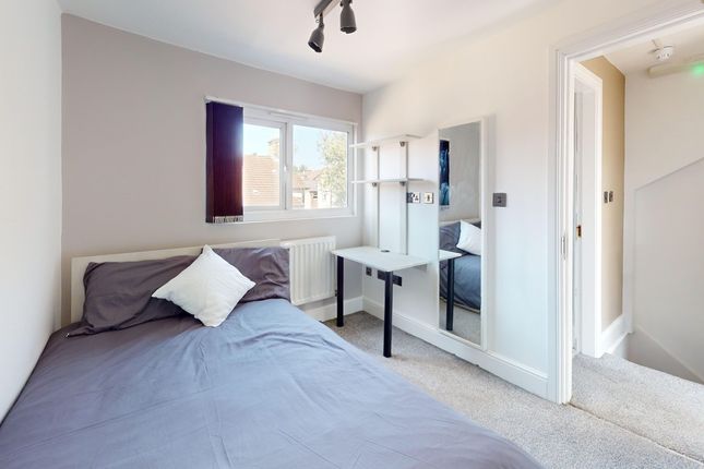 A Bright And Tidy Double Bedroom Featuring Modern ...