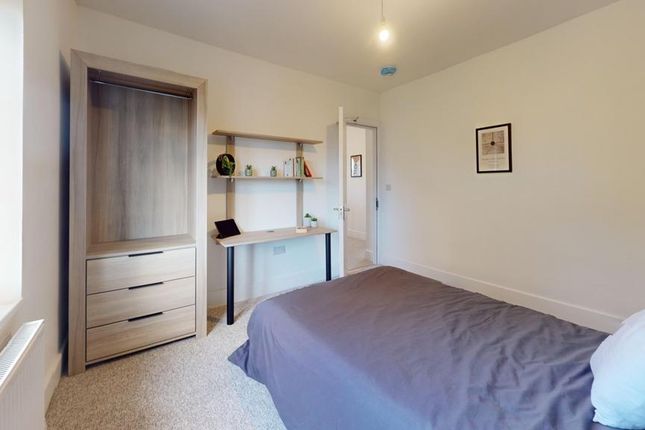 A Spacious And Tidy Double Bedroom Featuring A Fit...
