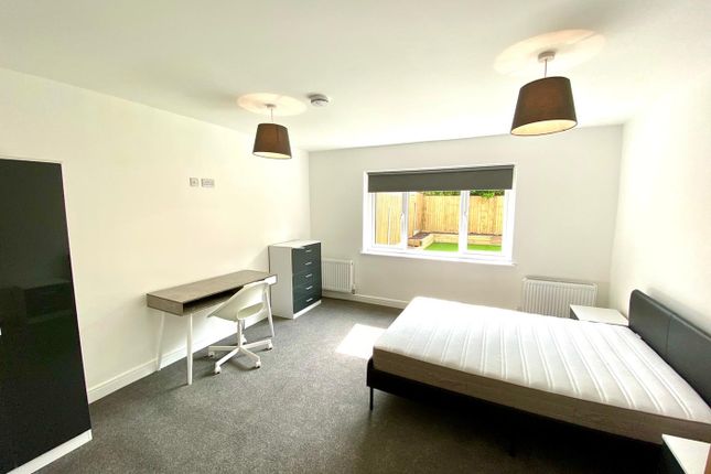 A Spacious And Well-Lit Double Bedroom Featuring A...