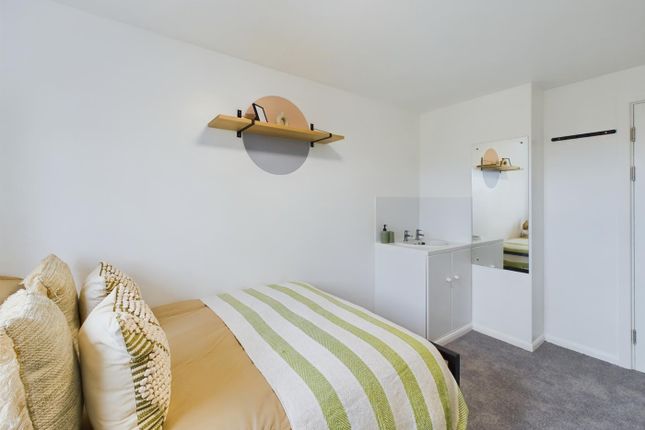 A Bright And Inviting Double Bedroom Featuring Mod...
