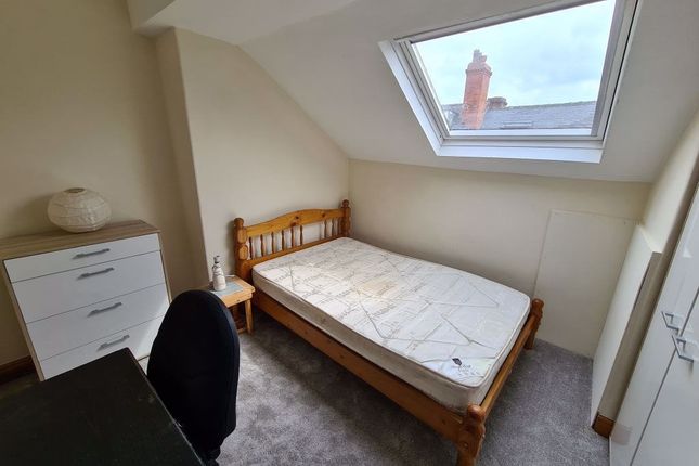 Bright And Cozy Single Bedroom Featuring A Sloped ...