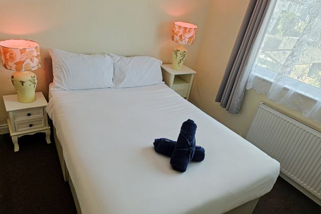 A Bright And Inviting Double Bedroom, Perfect For ...