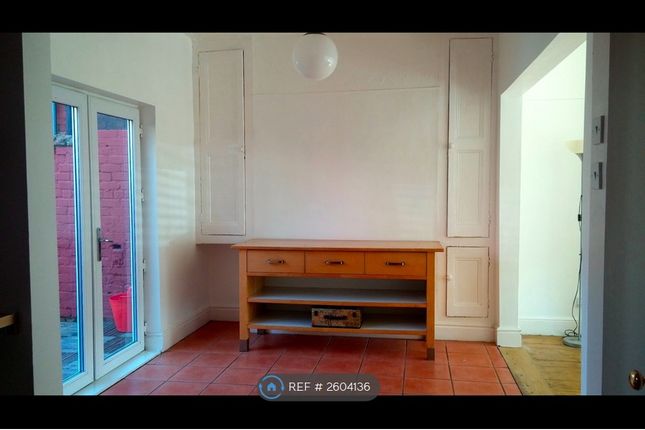 Dinning Room Area With Original Storage Cupboards.