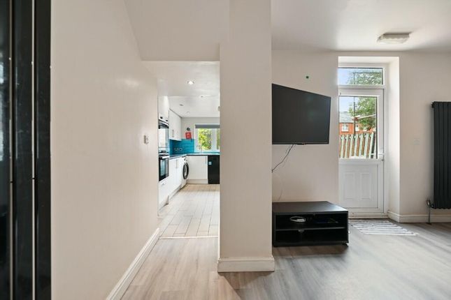 A Bright And Modern Living Space Featuring Light W...
