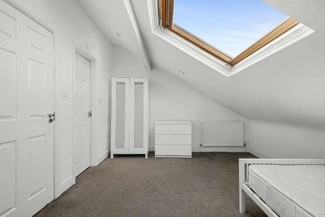 A Bright And Tidy Double Bedroom Featuring A Slant...