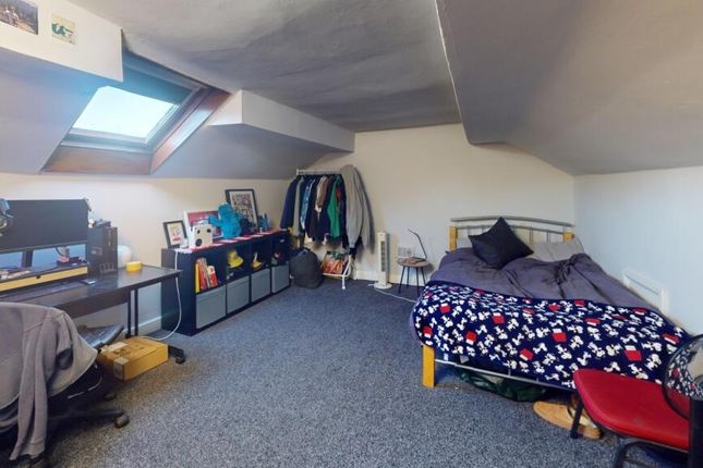 Bright And Spacious Attic Bedroom Featuring A Cozy...