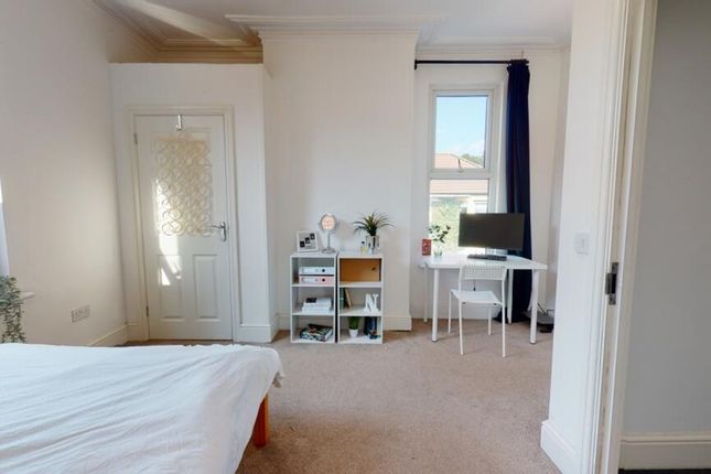 This Charming Double Bedroom Features Ample Natura...