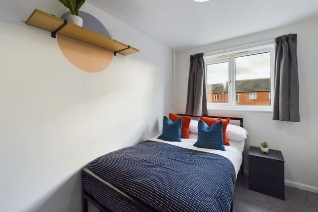 A Bright And Inviting Double Bedroom Featuring Sty...
