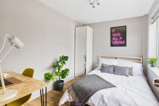 A Bright And Modern Double Bedroom Featuring Styli...