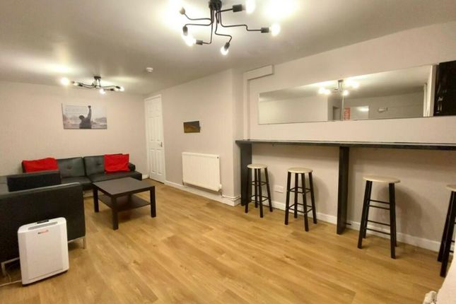 A Spacious And Stylish Modern Living Room, Perfect...