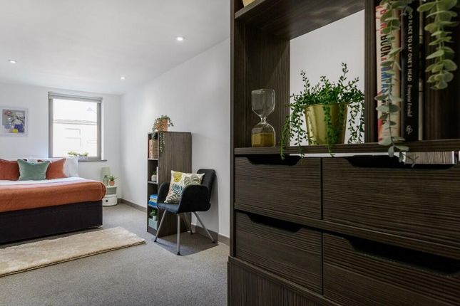 A Bright And Spacious Master Bedroom Featuring A c...