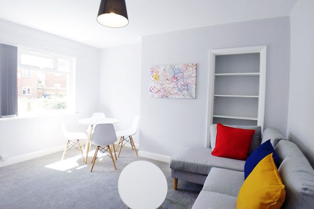Bright, Modern Living Room With A Comfy Grey Sofa ...
