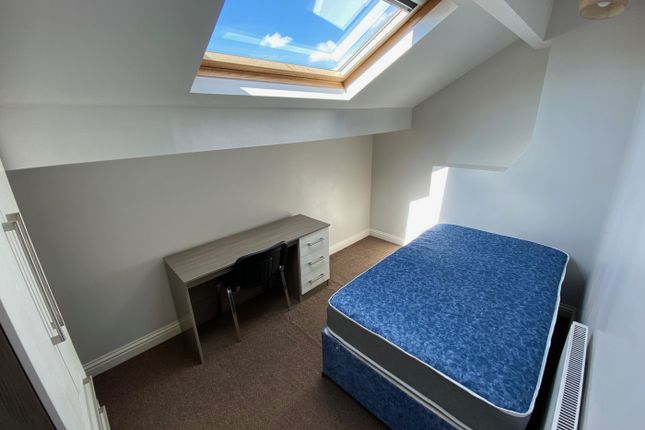 A Bright And Inviting Double Bedroom Featuring A S...