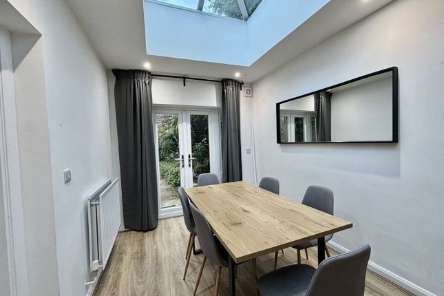 A Spacious And Inviting Living Room With Abundant ...