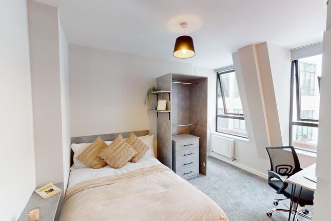 A Bright And Inviting Double Bedroom Featuring A S...