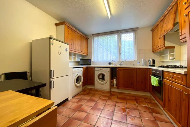 Bright Kitchen Featuring Terracotta Tiled Floor An...