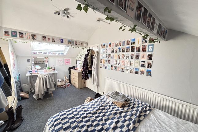 A Bright And Tidy Student Bedroom With A Comfortab...