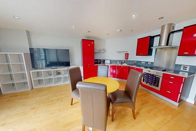 Bright And Modern Kitchen With Vibrant Red Cabinet...