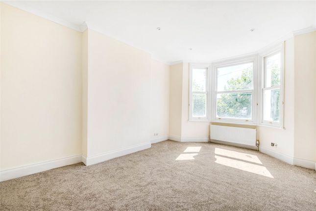 Semi-detached house to rent in Lower Downs Road, Raynes Park, London