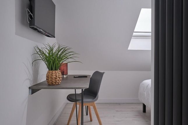 Bright And Modern Master Bedroom Featuring A Cozy ...