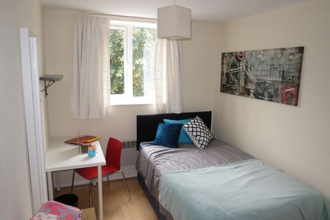 A Bright And Cozy Double Bedroom With A Stylish De...