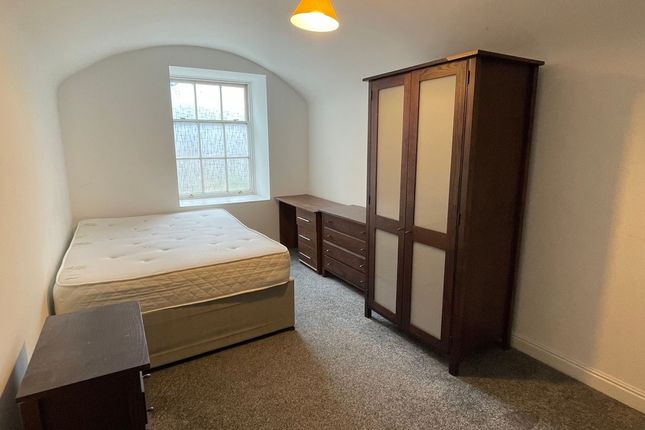 Bright Double Bedroom Featuring A Large Window Wit...