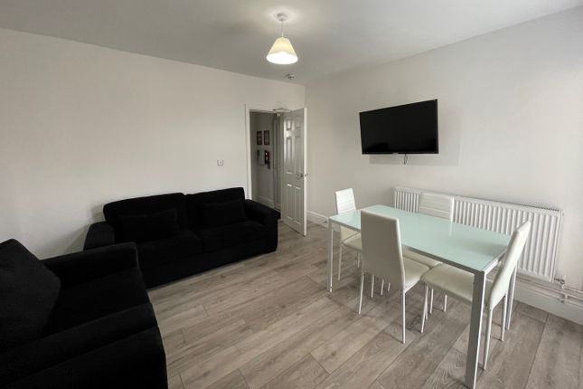 A Bright And Spacious Modern Living Room Featuring...