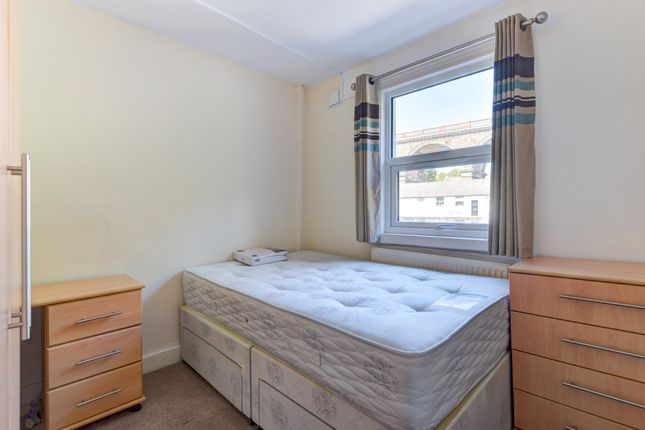 Bright And Tidy Single Bedroom Featuring A Comfort...