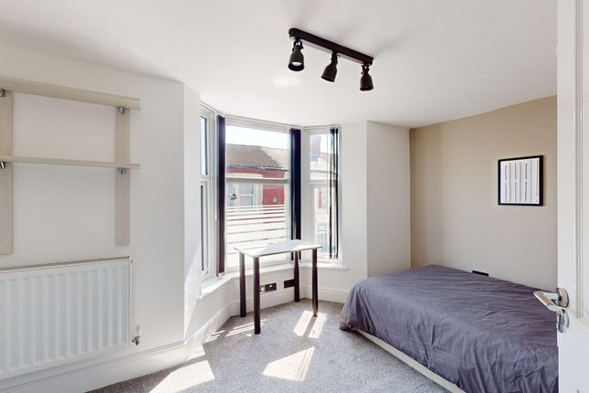 A Bright And Spacious Double Bedroom Featuring Lar...