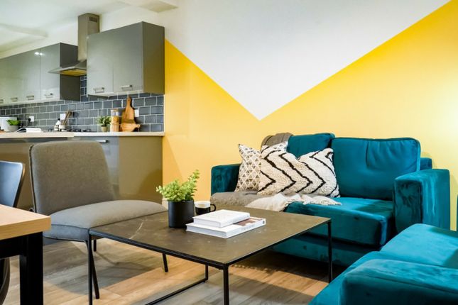 A Vibrant And Stylish Large Modern Living Room, Pe...