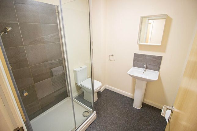 This Modern Bathroom Features A Sleek Shower, Styl...