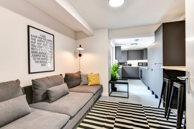 Bright, Modern Open-Plan Living Area With A Comfor...