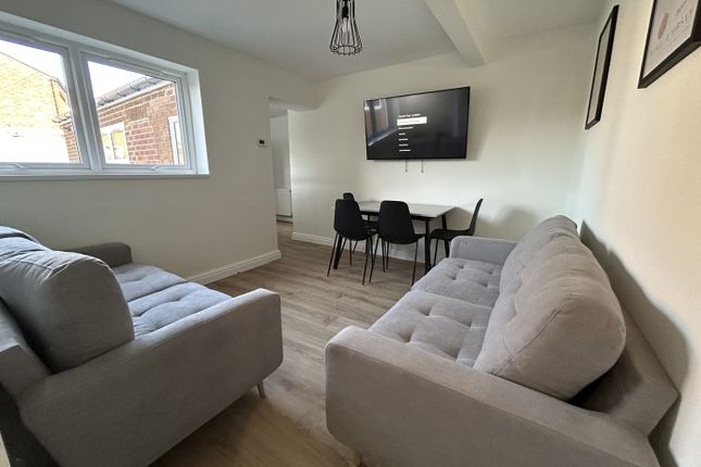 A Spacious And Inviting Modern Living Room, Perfec...