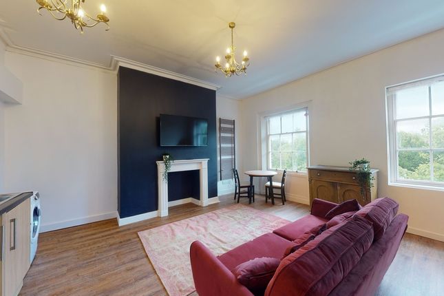 A Spacious And Inviting Large Modern Living Room W...