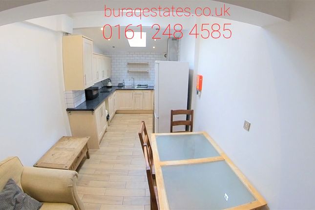 A Bright And Tidy Kitchen And Dining Area Featurin...