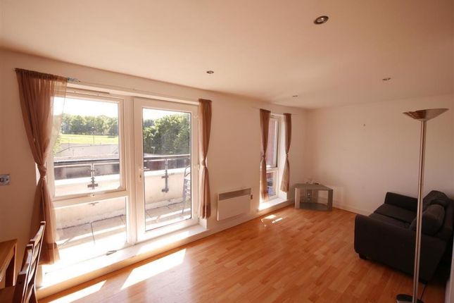 Bright And Airy Living Room Featuring Large Window...