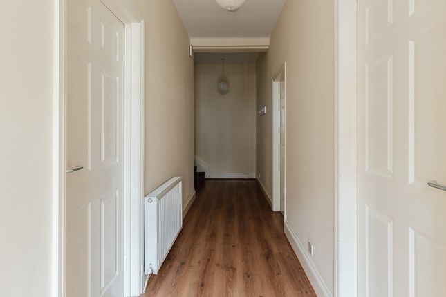 A Well-Maintained Hallway Featuring Clean Wooden F...