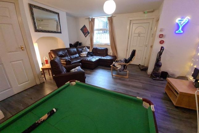 Spacious And Modern Living Room Featuring Comforta...