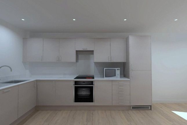 A Modern, Clean Kitchen Featuring Sleek Cabinetry,...