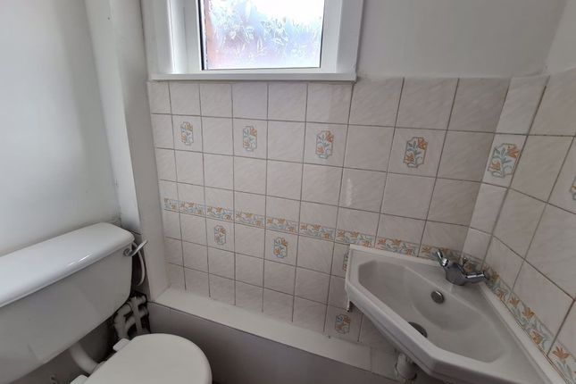Compact And Functional Single Toilet Area Featurin...