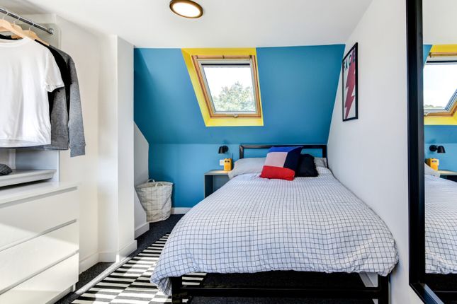 Bright And Stylish Double Bedroom Featuring A Comf...