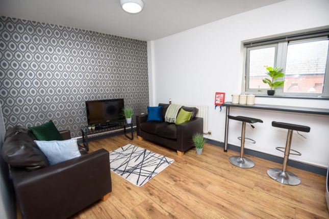 Stylish And Inviting Living Room Featuring Modern ...