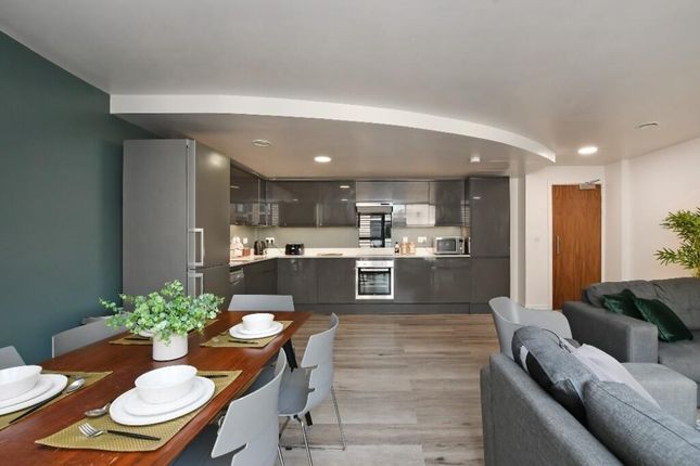 Modern Open-Plan Living Room And Kitchen Featuring...